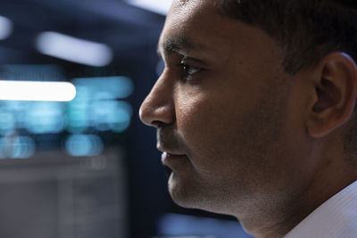 Side view of man looking away