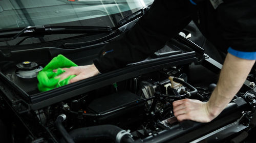 Man working in car