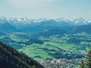 Scenic view of landscape and mountains against sky