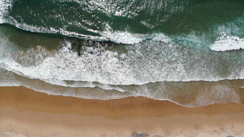 Full frame shot of surf on beach