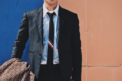 Close-up of man standing on floor