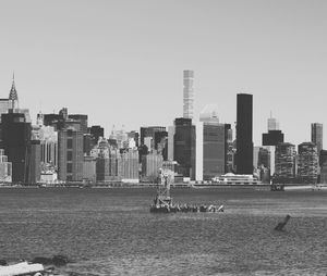 Skyscrapers in city against clear sky