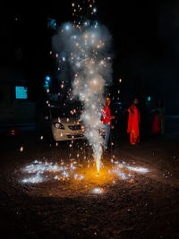 Firework display at night