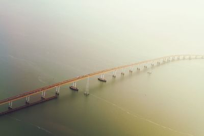 High angle view of bridge over calm sea