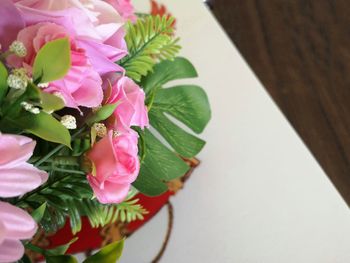 High angle view of pink flowering plant on table