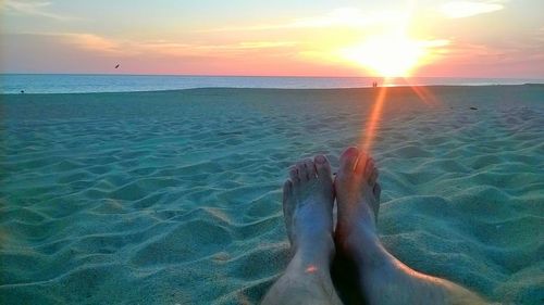 Scenic view of sea at sunset