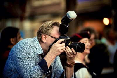 Man photographing with camera