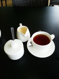 High angle view of coffee cup on table