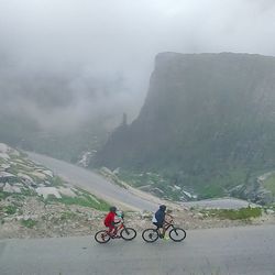 Person riding bicycle on road