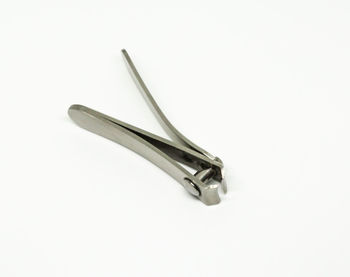 High angle view of electric lamp against white background