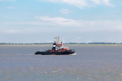 Pilot ship or tugboat on the sea