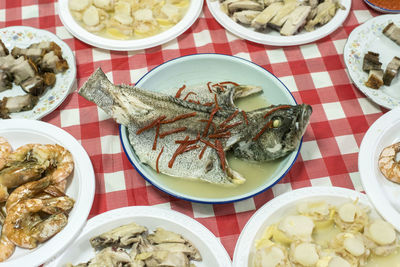 High angle view of food in plates on table