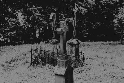 Old metal structure on field during winter