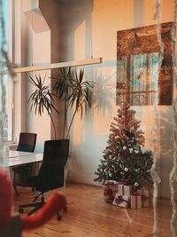 Low section of woman sitting on table