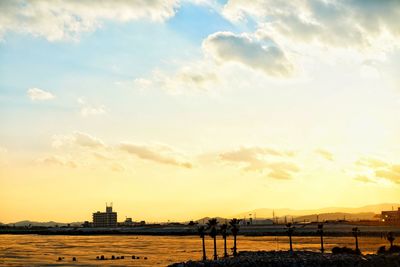 Scenic view of sunset over city