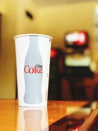 Close-up of coffee cup on table