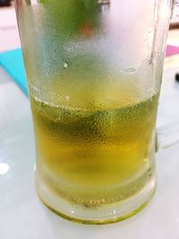 Close-up of beer in glass on table