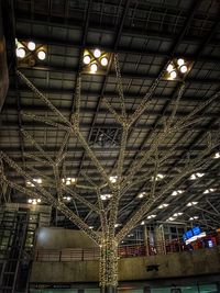 Low angle view of illuminated lights at night