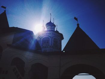 Low angle view of church against blue sky