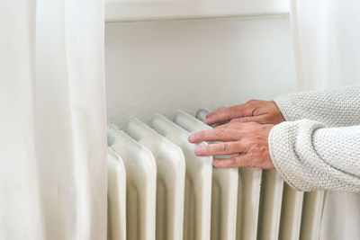 High angle view of woman standing at home