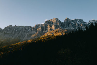 Scenic view of mountains against sky at night