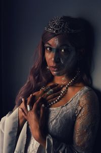 Portrait of a young woman making face