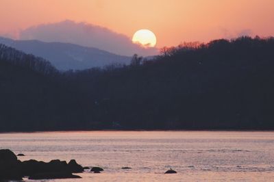 Scenic view of landscape at sunset