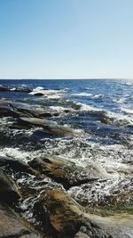 Scenic view of sea against clear sky