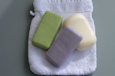 Directly above shot of soap bar on towel