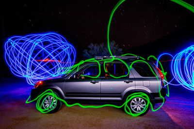 Light trails on car at night
