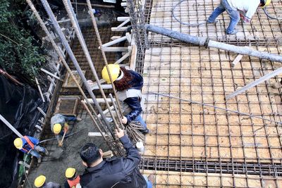 High angle view of people working at construction site