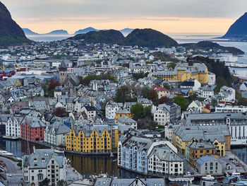 High angle view of townscape during sunset