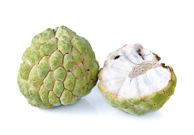 Close-up of fruits against white background