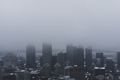 Modern buildings in city against sky