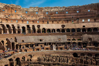 View of the seating areas and the hypogeum of the ancient colosseum in rome