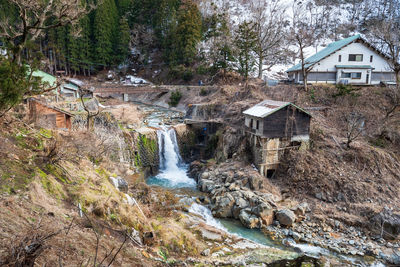 Waterfall on mountain on the way to jigokudani monkey park by shibu onsen in nagano, japan.