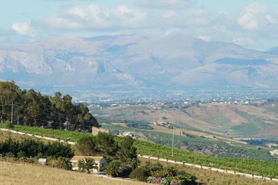 High angle view of landscape and mountains against sky