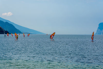 Windsurfers on lake garda near torbole in italy.