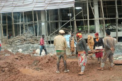 Couple standing in front of building