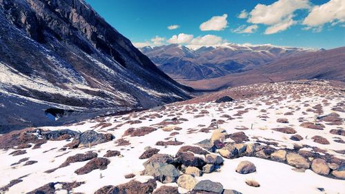 Scenic view of mountains against sky during winter