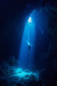 Low angle view of person swimming in sea