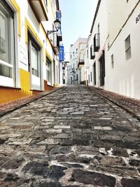 Narrow alley with buildings in background