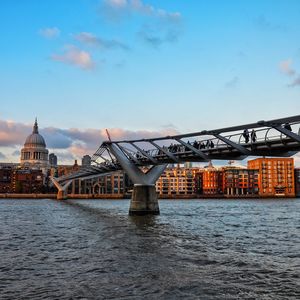 View of bridge over river in city