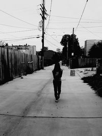 Man walking on road