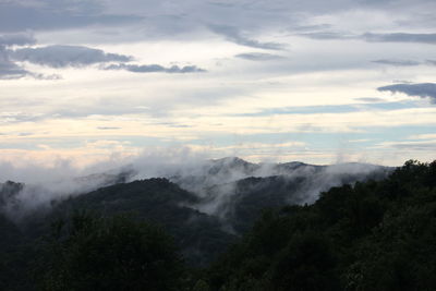 Scenic view of mountains against sky during sunset