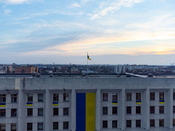 Buildings in city against sky