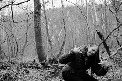 Woman in forest during winter