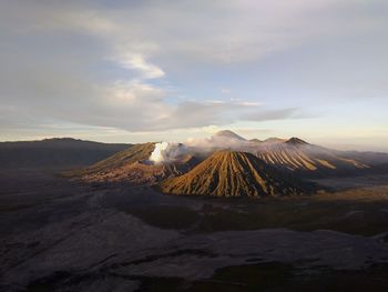 Scenic view of volcanic landscape against sky