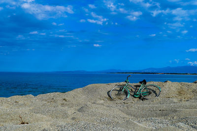 Scenic view of sea against blue sky