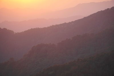 Scenic view of mountains against sky at morning